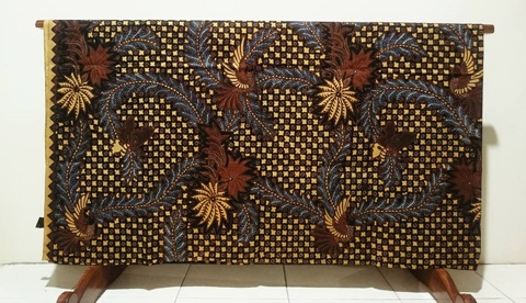 The technique of making batik fabric using Canting or Tulis traditional